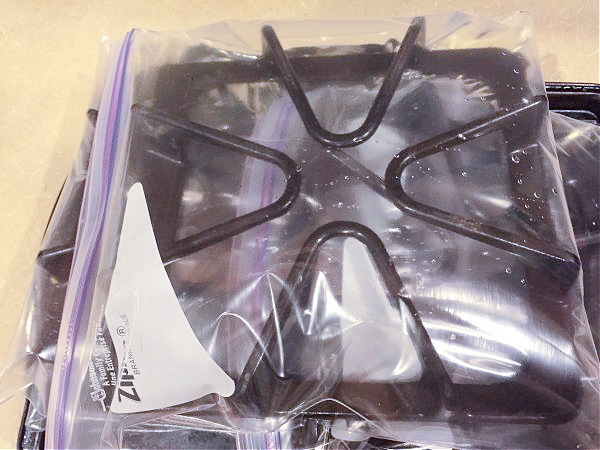 Stove Grates in Ziploc Bags with ammonia for cleaning