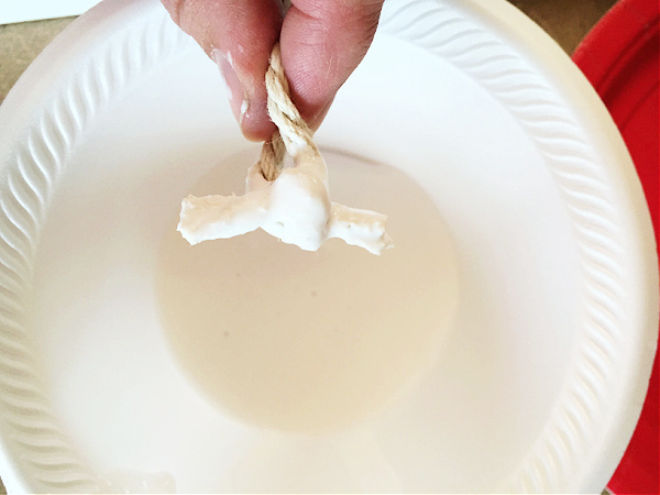 Knotted rope dipped in glue to prevent unraveling