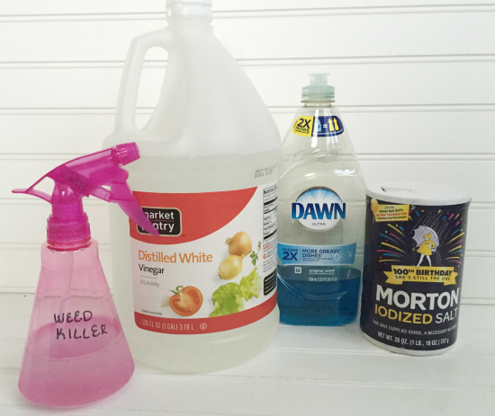 Items needed to make weed killer: vinegar, dish soap, salt and a spray bottle