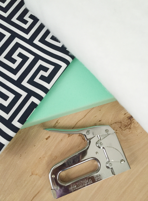 Items needed to make a bench cushion: fabric, batting, foam, and staple gun