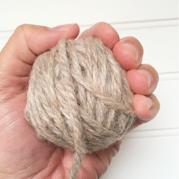 DIY Wool Dryer Ball in hand