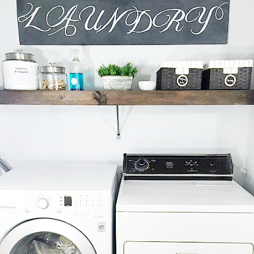 Laundry room with painted dryer to match washer
