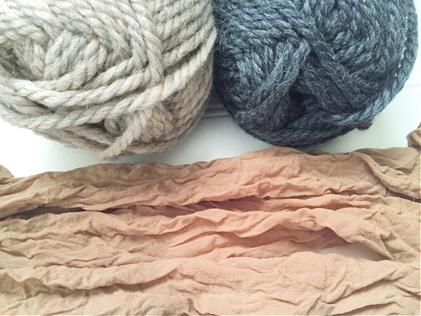 Items needed to make your own dryer balls: wool yarn and nylons