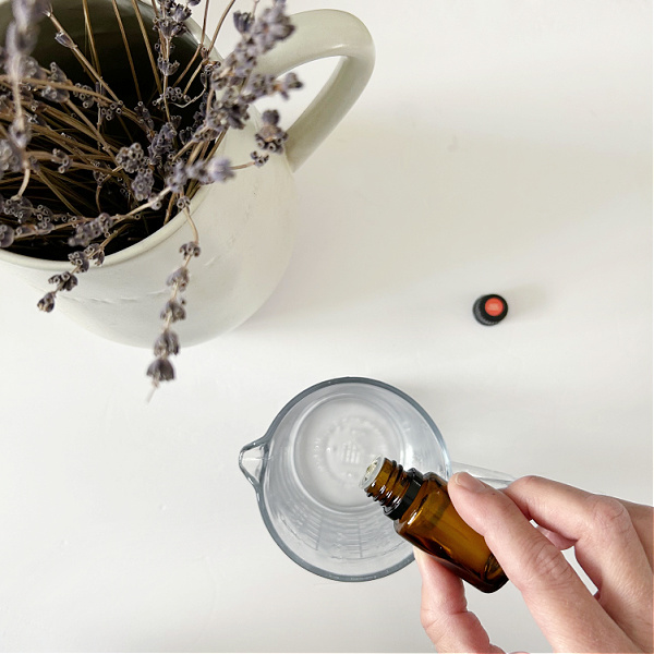 Adding essential oil to natural all purpose cleaner