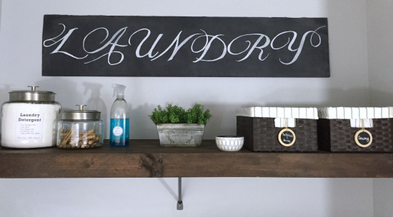 Laundry room with DIY Faux Wood Shelf created with a wood overlay that sits on top of the original wire shelving