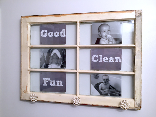 Window turned into towel rack with picture of kids in bathtub filling the window panes