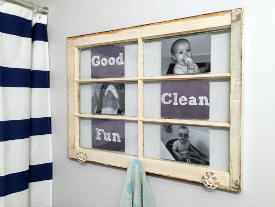 An old wooden window is made into a towel rack in a kids' bathroom