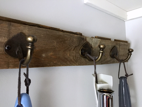 Cleaning Closet Reveal: DIY Cleaning Tools Holder made with barn wood and rustic hooks