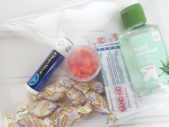 Purse Organization First Aid Pouch with cough drops, sanitizer, and bandaids