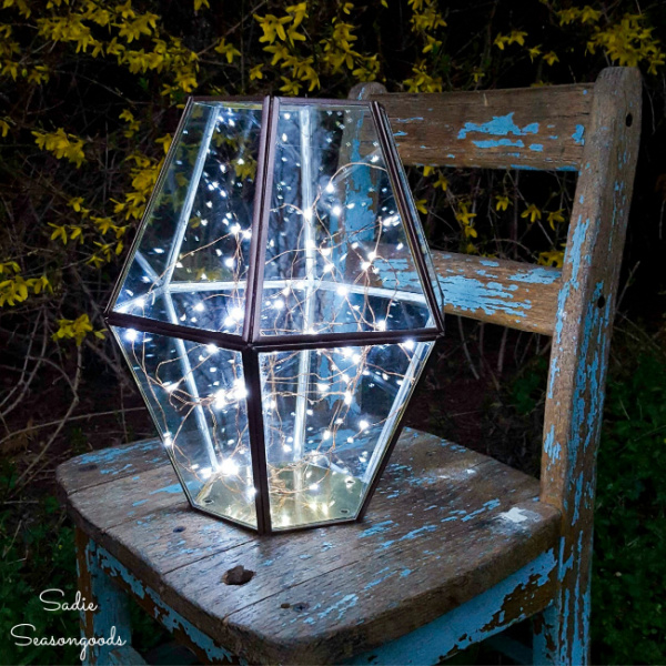 DIY Hurricane lantern filled with twinkle lights