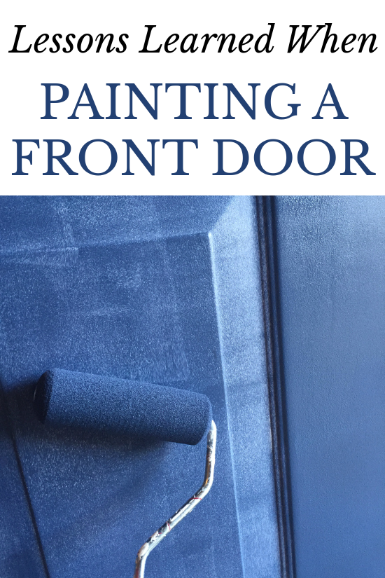 Painting front door blue using a foam paint roller