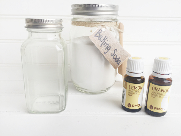 Items needed to make fridge deodorizer: baking soda, essential oil and a spice jar