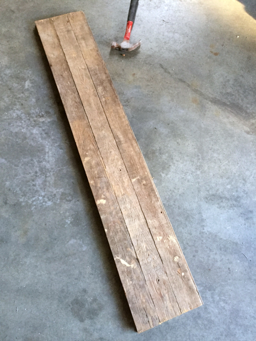 Strips of barnwood that will be used to make a welcome sign for porch