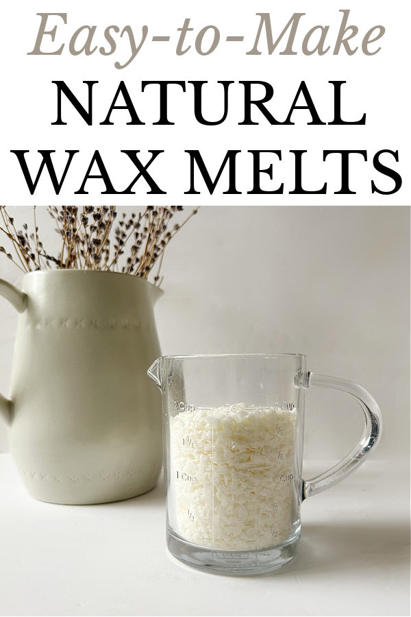 Liquid measuring cup filled with soy wax flakes