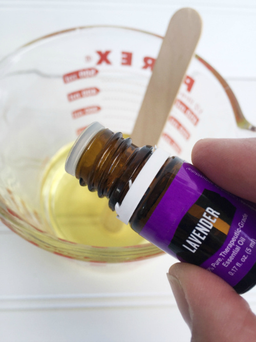 Adding lavender essential oil to homemade wax melts