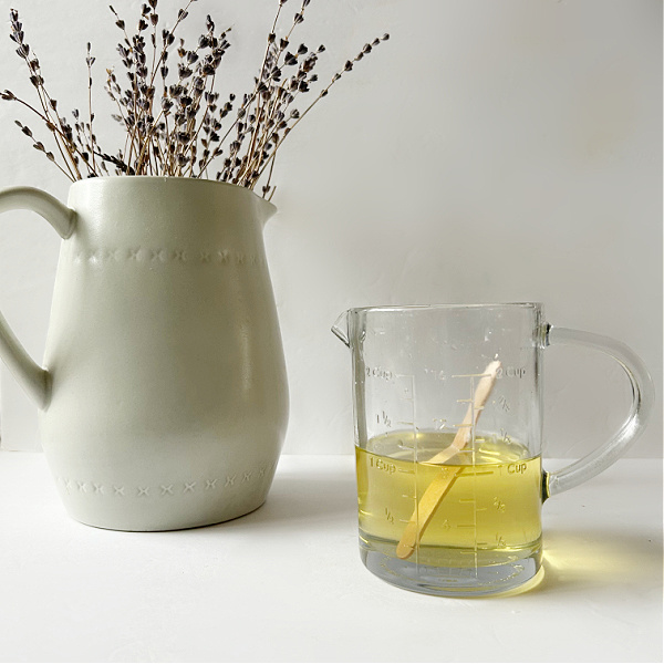 Melted wax in liquid measuring cup