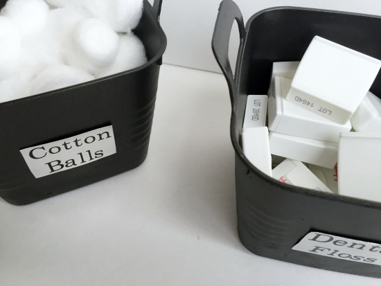 Dollar store bins get a makeover for bathroom storage