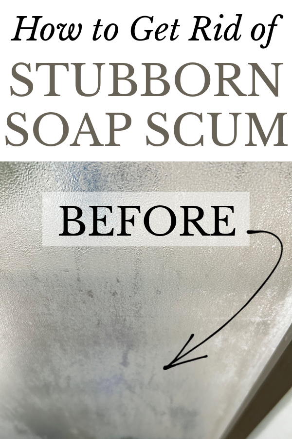 Soap scum on glass shower doors prior to cleaning