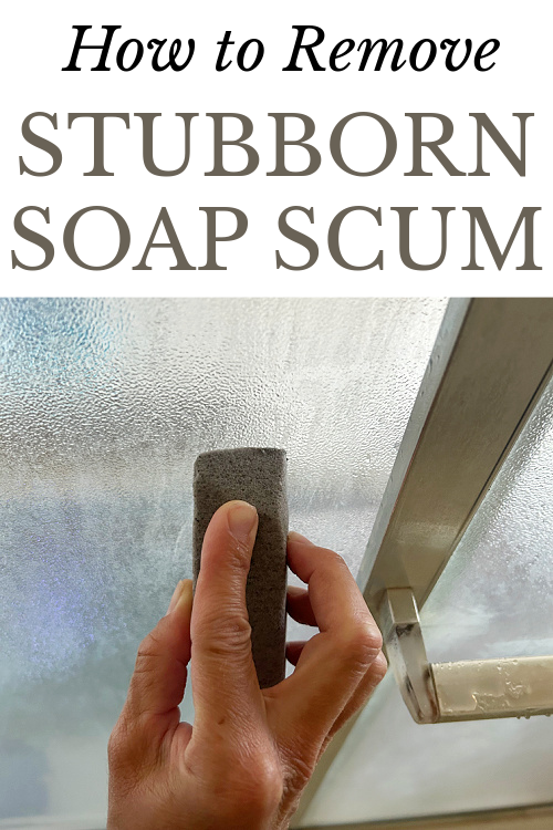 Using pumice stone to clean a tempered glass shower door