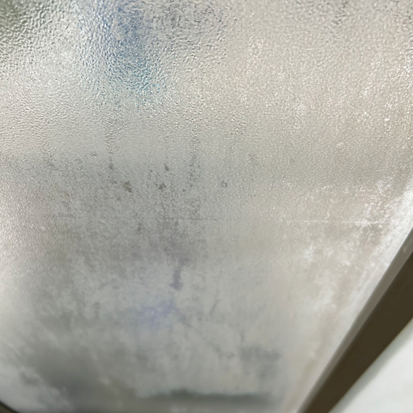 Soap Scum Build Up inside shower door