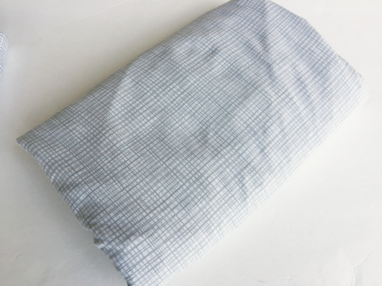 Easy to follow instructions for folding a fitted sheet.