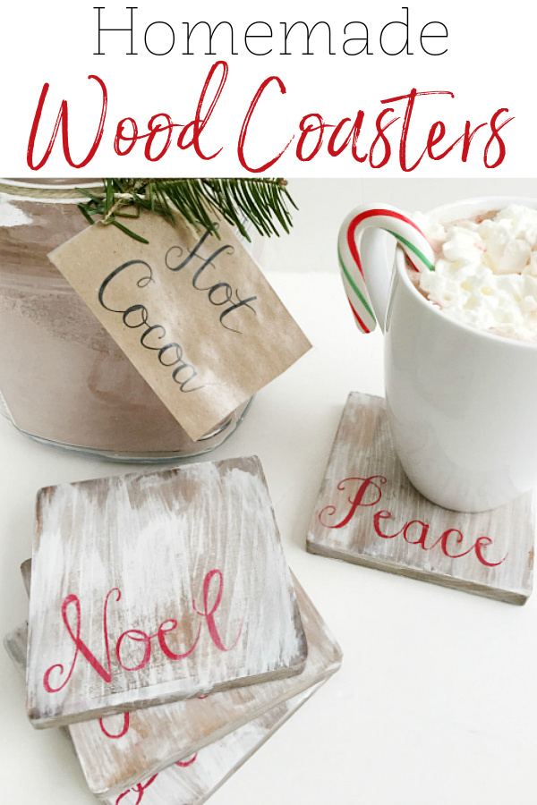 Homemade farmhouse style white-washed wood coasters displayed with cups of hot cocoa