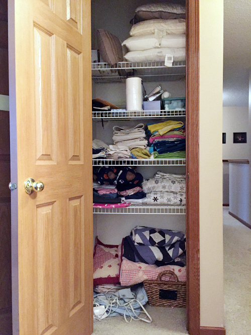 Linen closet prior to makeover