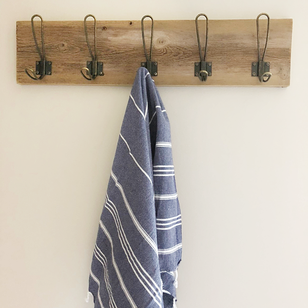 Turkish towel hanging from towel rack