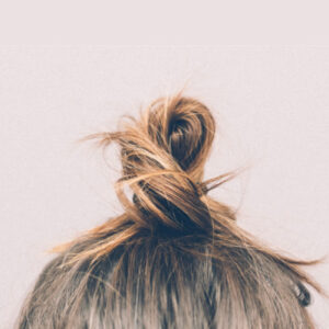 Hair in Bun: How to Clean Your House After Head Lice