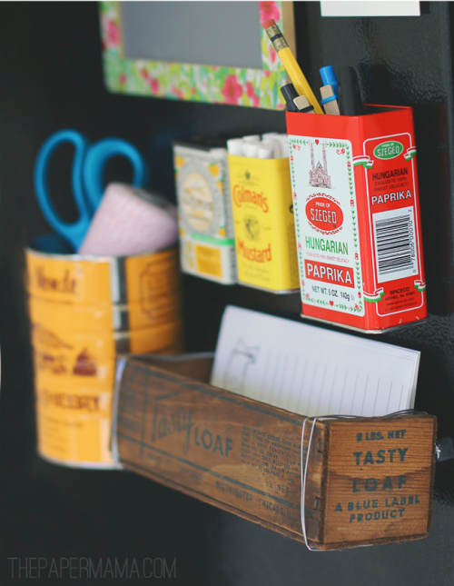 Spice tins used as free storage on side of refrigerator