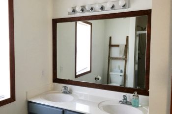 DIY for Less: Framing A Builder Grade Bathroom Mirror for $20