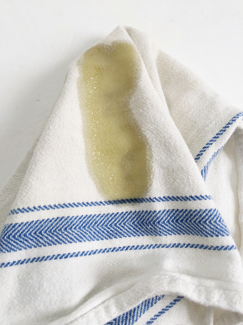 Olive oil added to dish towel