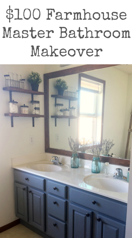 This $100 farmhouse master bathroom makeover includes a painted vanity, framed mirror, open shelving, a rustic ladder, and gallery wall