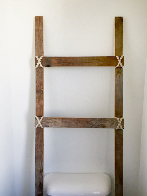 Lovin' this rustic ladder for the master bathroom!