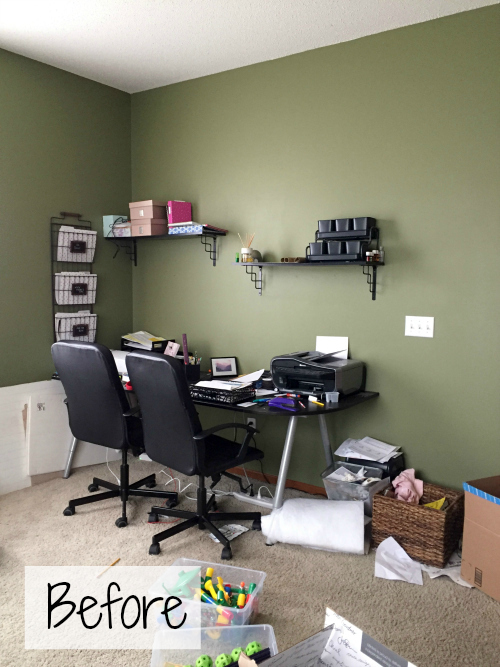 Desk area before office makeover showing desk area and two shelves on green wall