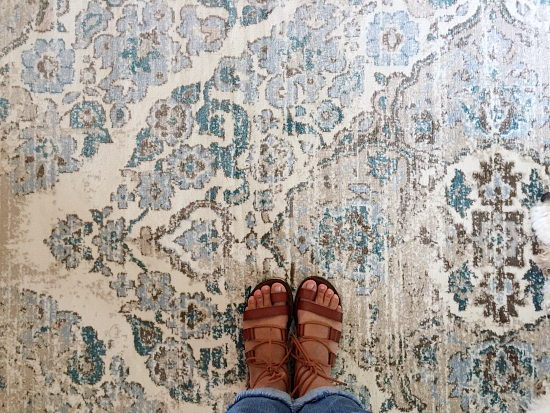 Distressed vintage-looking rug purchased for the living room