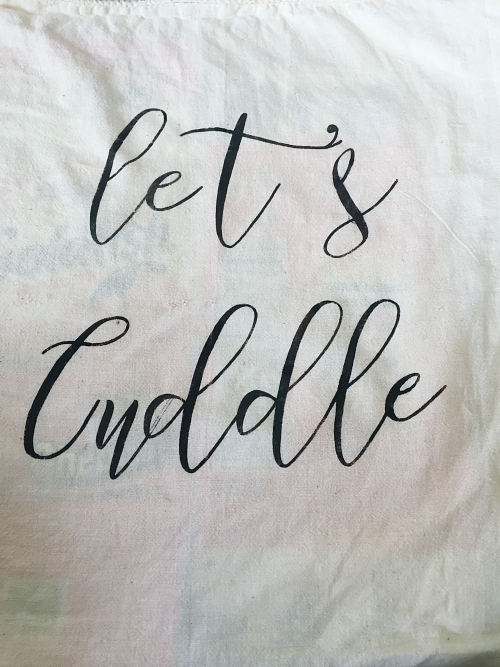 Finished DIY Farmhouse pillow cover with the words 