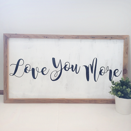 DIY Farmhouse style sign with the saying "Love You More"