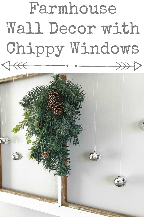 Farmhouse Wall Decor using an old window, decorated for Christmas.