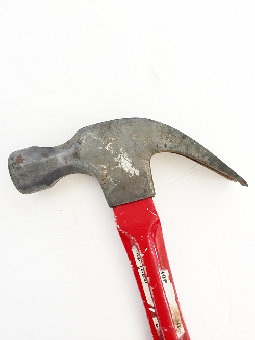 Hammer with hardly any rust remaining after removing rust with ketchup