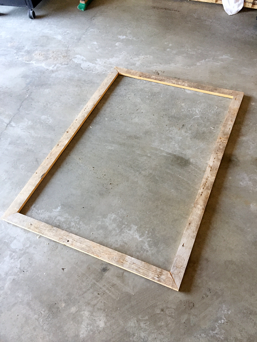 Assembled DIY barn wood frame for bathroom mirror