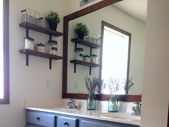 Bathroom mirror after adding a DIY wood frame