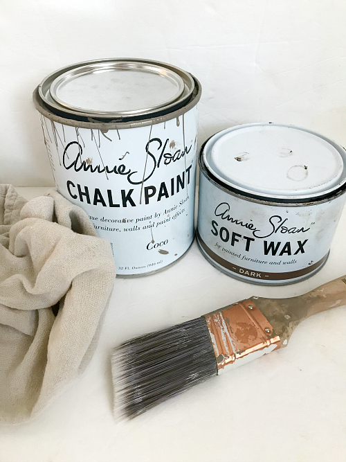 Supplies needed to create a weathered wood look with chalk paint and wax: chalk paint, wax, lint-free cloth, and paint brush