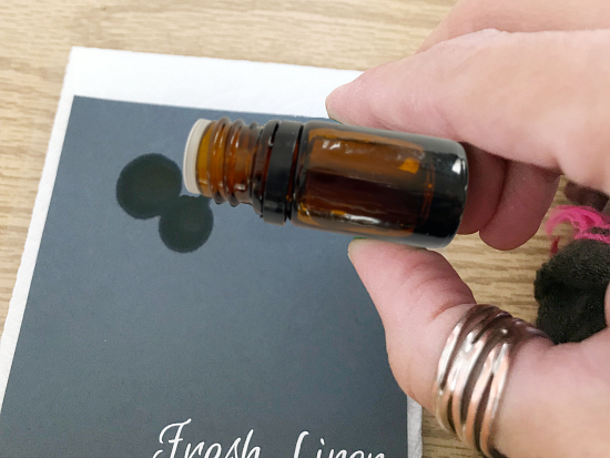 Adding a few drops of essential oil to cardstock to freshen drawers.