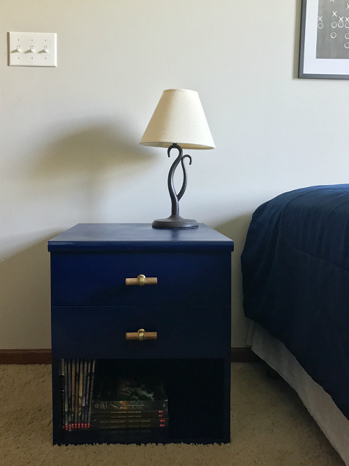 Nightstand made over with spray paint in bedroom