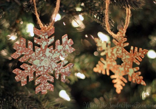 Faux aged copper snowflake ornaments made from a cereal box