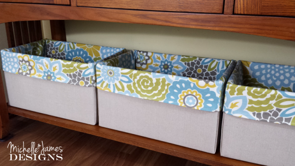 Dropcloth and fabric covered bins used as storage