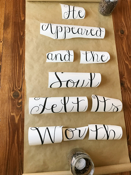 Vinyl letters placed on kraft paper scroll