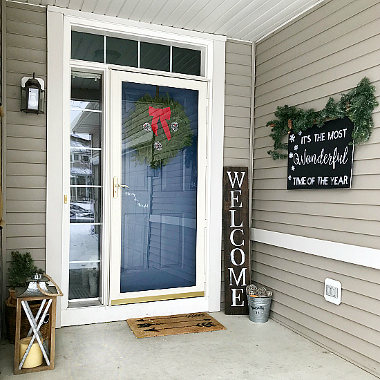 Budget friendly Christmas porch with lots of easy DIYs