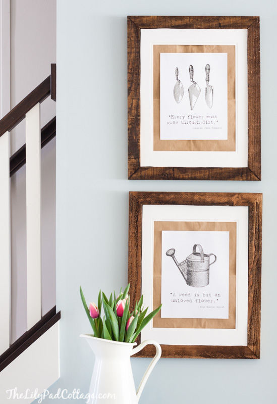 Gallery wall of gardening prints used as budget-friendly spring decor